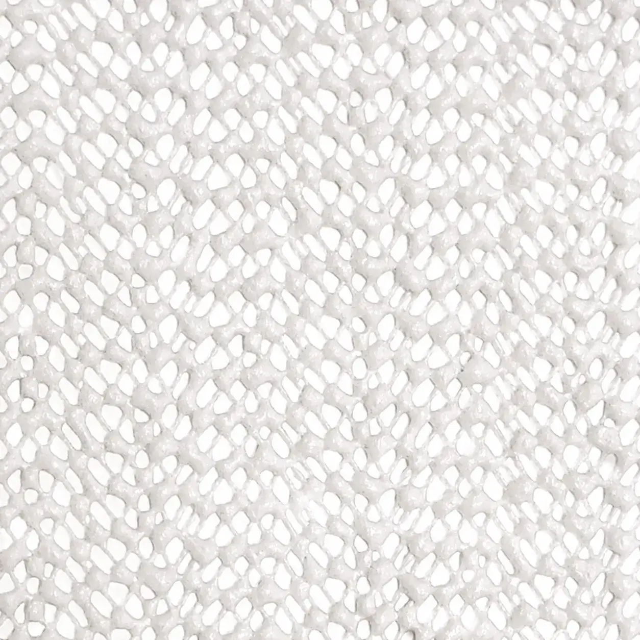 Close-up view of white PVC foam mesh texture with breathable open structure