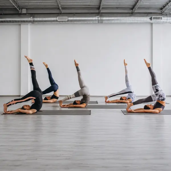 The woman on the yoga mat