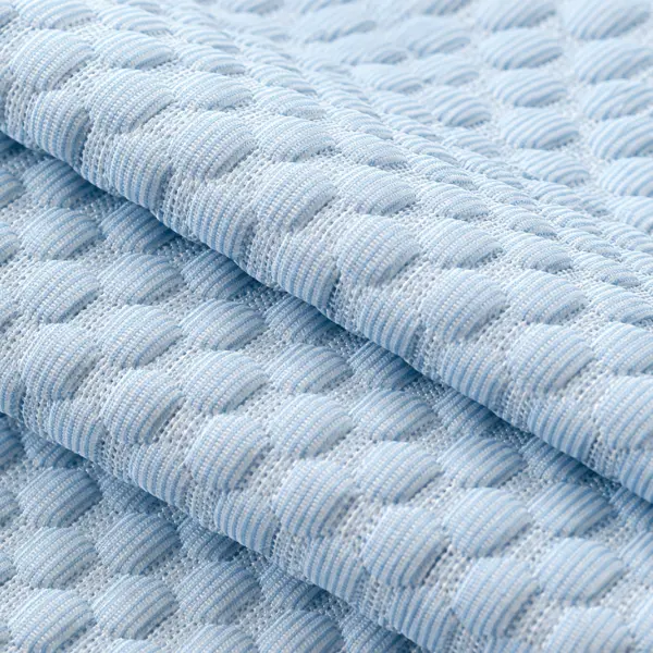 pet-cooling-mat-ice-silk-fabric-texture Close-up view of breathable pet cooling mat surface material designed to provide comfortable cooling support for pets