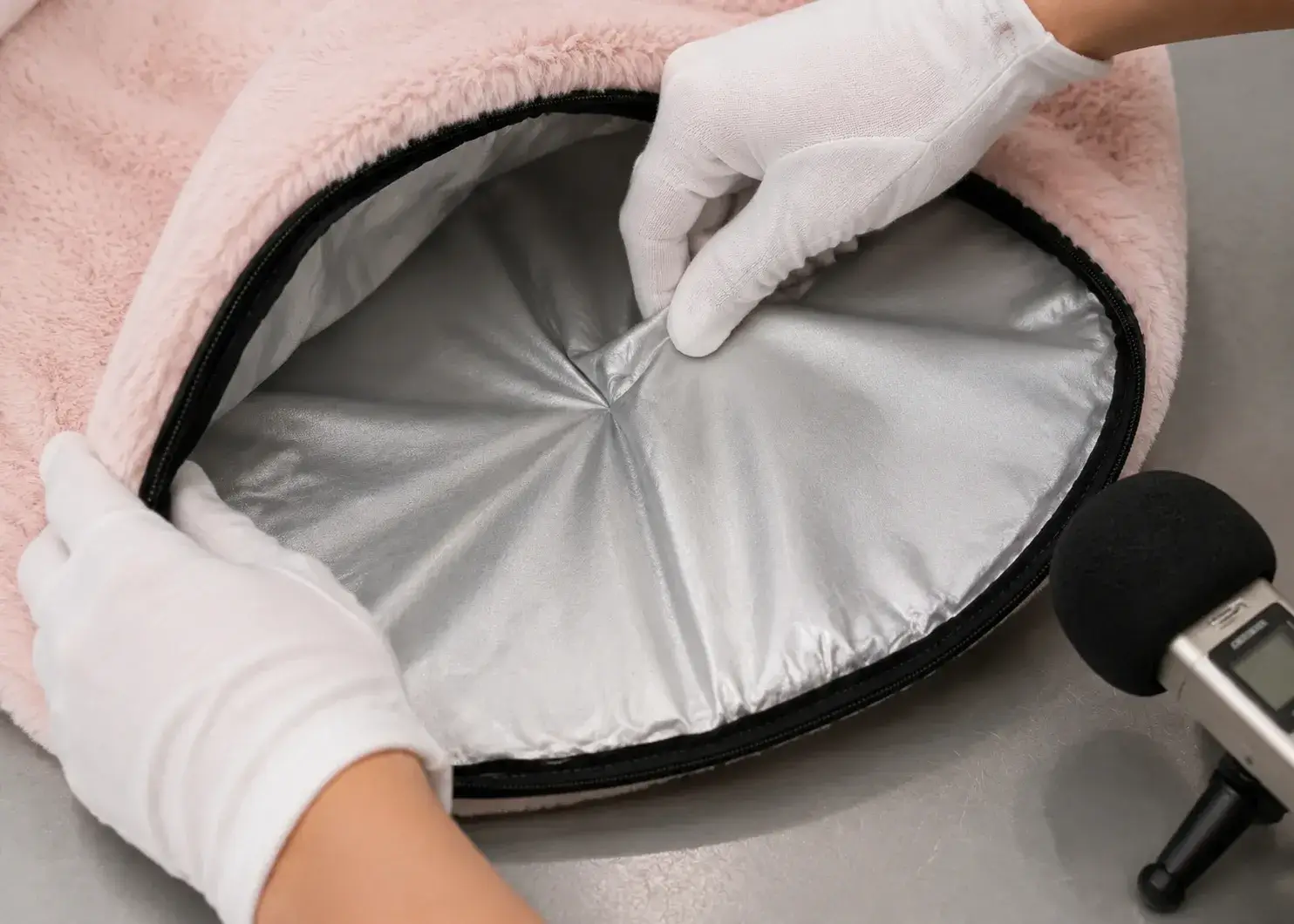 Friction sound test on the quiet silver lining inside a pet warming mat