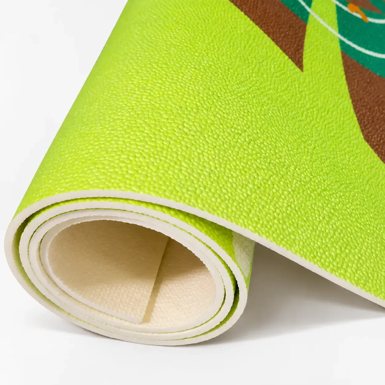 Texture and rolled edge of a high-density PVC foam kids play mat